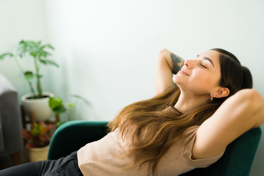 Calm and relaxed young woman with good mental health