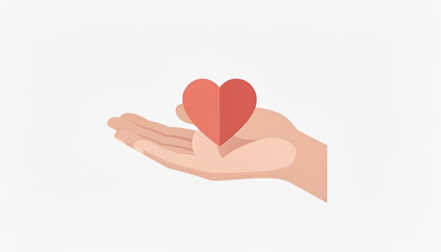 Open hand holding a small heart-shaped ceramic object on a desk with a notebook